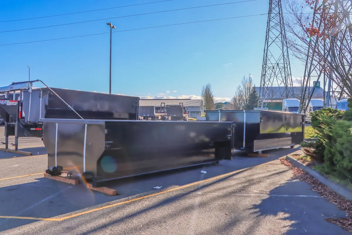 Roll-off dumpster ready for waste disposal at job site for 2 Yard Dumpster Rental in Waterloo